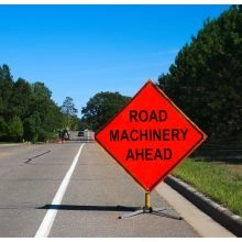 Roll Up Traffic Sign In Action