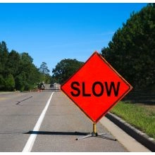 Roll Up Traffic Sign In Action